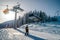 Skiers on slope and ski lift chair at resort Jasna, Slovakia