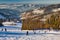 Skiers on slope of Velka Raca - Oscadnica ski resort