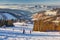 Skiers on slope of Velka Raca - Oscadnica ski resort