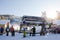 Skiers and snouborders on snow slope in winter ski resort. Ski elevator on snow mountain. Winter activity concept. Cable car ski