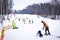 Skiers on a snow slide. Winter fun