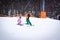 Skiers on a snow slide. Winter fun