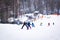 Skiers on a snow slide. Winter fun