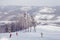 Skiers and snowboarders in the mountains of Urals