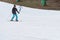 Skiers and snowboarders riding on a ski slope