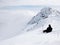 Skiers and snowboarders riding on a ski slope