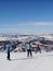 Skiers and snowboarders on top of Storm Peak