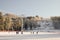 Skiers and snowborders on snow slope in winter ski resort. Ski elevator. Winter activity concept. Ski chair-lift at Altai