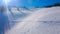 The skiers on snowy slope of Zwolferhorn, St Gilgen, Austria