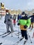 Skiers wearing masks and waiting at the line to the lifts at Okemo mountain ski resort