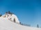 Skiing path in the mountains covered with snow