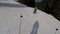 Skiing skiers on the piste in Bukovel ski resort, Ukraine