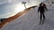 Skiing skiers on the piste in Bukovel ski resort, Ukraine