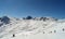 Skiing and snowboarding on the mountain of Les arcs, France.