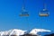 Skiing and snowboarding in ski piste and ski lift in the alps switzerland