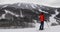 Skiing woman. Alpine ski - skier looking at mountain view against snow covered trees and ski in winter. Mont Tremblant