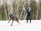 A skijoring woman have fun in forest