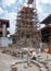 A Skilled Craftsman Shaping Stone for a Temple Rebuilding Project