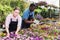 Skilled florists working with flowers