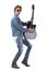 Skillful talented young stylish man guitarist playing guitar holding it vertically.