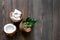 Skin care. Coconut lotion on wooden table background top view copyspace