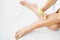 Skin Care and Health. Hair Removal. Fit Young Woman Waxing Her Legs With a Portable Roll-on Depilatory Wax Heater For