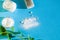 skin care with natural products baking soda,  coconut oil,  salt soap top view on bright blue background