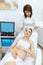 Skin Care. Pregnant Woman On Face Cleansing At Beauty Clinic
