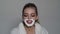Skin care and shaving concept. Woman covered face with foam. Lady cares about smooth skin. Girl with smiling face in