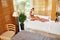 Skin Care Spa Treatment. Woman On Bathtub. Flower Rose Bath.