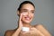 Skin Care. Woman Applying Anti Aging Cream