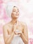 Skin Care, Woman Applying Cream in Bath Towel after Spa, Treatment Cosmetic Moisturizing Lotion