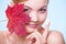 Skin care. woman girl with red leaf and cream