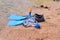 Skin diving equipment standing ready on a beach