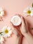 Skincare and beauty with delicate hands holding a cosmetic cream