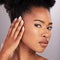 Skincare, beauty and touch, portrait black woman with pride, white background and cosmetics product. Health, dermatology