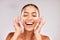 Skincare, beauty and woman with face cream in a studio doing a natural face and skin routine. Cosmetic, wellness and