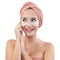 Skincare. cheerful young woman smiling, applying cosmetic eye patches mask, reduces wrinkles, wears wrapped towel on head,