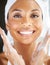 Skincare, closeup of woman cleaning face and smile for beauty in portrait. Satisfied with shine, routine or hygiene and