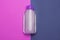 Skincare cosmetic bottle, product for cleansing and make-up remove, top view, pastel color background, minimalistic