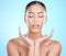 Skincare, hands and face of woman in studio for natural healing, youth glow and skin wellness on blue mockup for