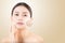 Skincare and health and cosmetics concept - beautiful asian young woman face