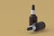 Skincare serum in dropper bottles on beige background. Copy space