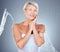 Skincare, water splash and portrait of senior woman in studio for wellness, healthy skin and hydration. Beauty, spa and