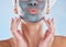 Skincare wellness, charcoal face mask and beauty product for healthy skin against blue mockup studio background. Model