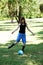 Skinny Caucasian Teen Girl Kicking Blue Soccer Ball