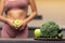 Skinny Girl Dieting Standing In Kitchen, Focus On Vegetables, Cropped