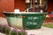 Skip bin with household waste rubbish on a front yard. House clean up concept