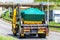 Skip lorry truck on uk motorway in fast motion