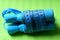 Skipping rope in cyan color tied with measuring tape